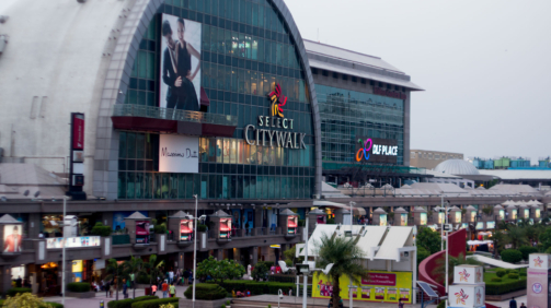Delhi, India - 29th May 2016: Outside view of the famous Select Citywalk shopping mall in Saket, Delhi. The huge crowds testify the popularity of these shopping places