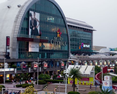 Delhi, India - 29th May 2016: Outside view of the famous Select Citywalk shopping mall in Saket, Delhi. The huge crowds testify the popularity of these shopping places